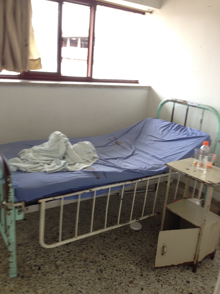 A bed in the hospital in Colombia. Photo by Michael Menconi